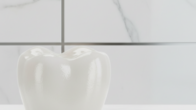 A photorealistic, ultra-detailed close-up of a perfect, naturally translucent white dental crown, showing a subtle sheen. The background is softly blurred, hinting at a modern, high-end clinic interior or a sophisticated Swiss setting. No visible text.