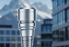 A photorealistic close-up of a pristine, metallic dental implant, gleaming and in sharp focus. The background is softly blurred, revealing the majestic, snow-capped peaks of the Swiss Alps or modern Swiss architecture, without any visible text.