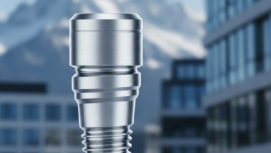 A photorealistic close-up of a pristine, metallic dental implant, gleaming and in sharp focus. The background is softly blurred, revealing the majestic, snow-capped peaks of the Swiss Alps or modern Swiss architecture, without any visible text.