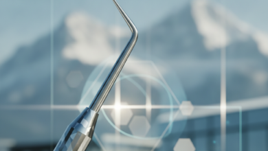 Close-up, sharp focus on a modern, polished dental mirror. In the softly blurred mid-ground, abstract geometric shapes and light patterns suggest financial data or planning. The deeply blurred background reveals a majestic, snow-capped Swiss mountain landscape. No text, numbers, or symbols are visible.