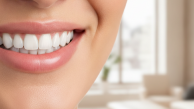 A close-up, photorealistic image of a person's healthy, bright white teeth in a confident, radiant smile. The background is softly blurred, suggesting a clean, modern, and elegant dental clinic interior, evoking a high-end cosmetic dental treatment experience in Geneva.
